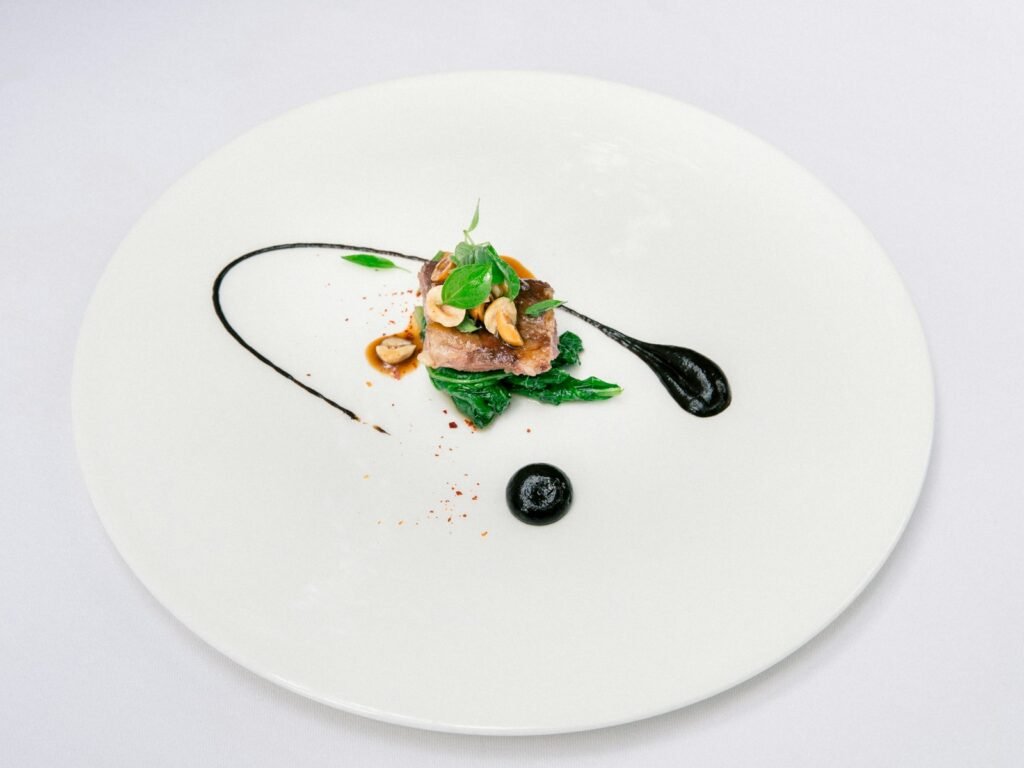 green vegetable on white ceramic plate